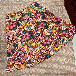 A line skirt with awesome print. Side zipper. size 42 goes for a largish medium